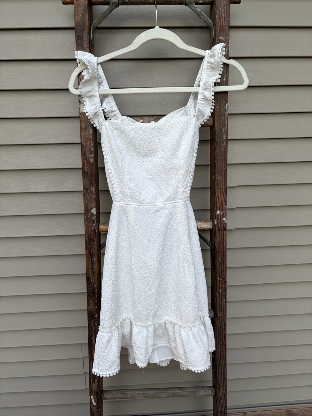 White Ruffle dress with Pom-Pom Trim